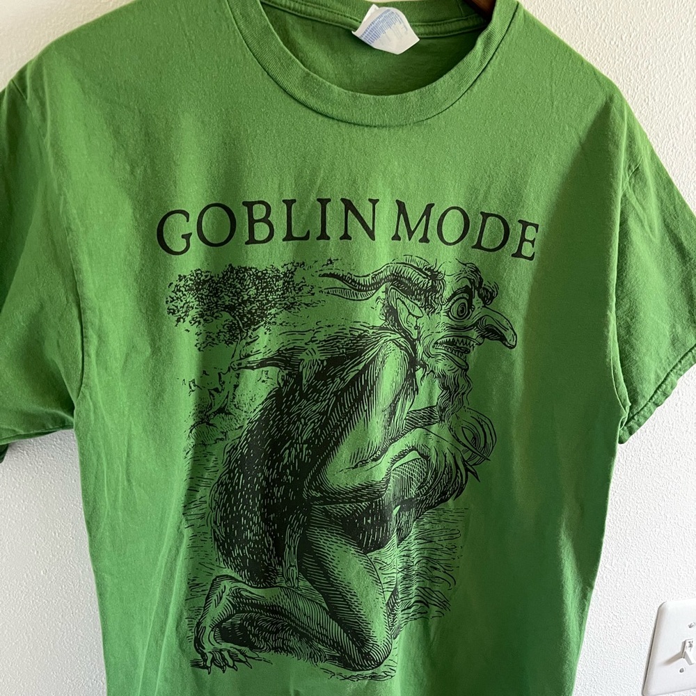 Goblin Mode graphic t shirt in green.